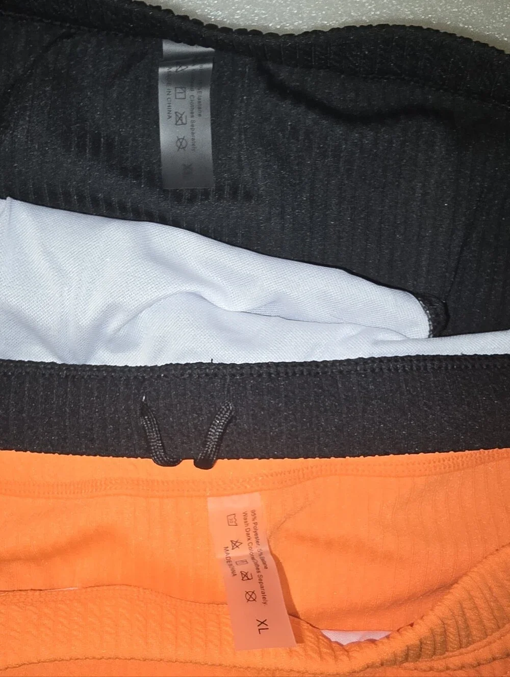 Men's Ribbed Bikini Swim Briefs in Black + Orange - Large